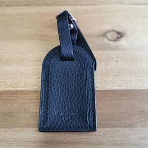 Authentic Louis Vuitton black leather luggage tag